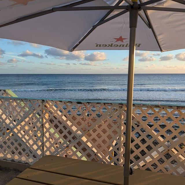 Patio umbrella over the water